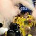 Michigan senior Blake McLimans leads the team through smoke to the court at the start of the national championship game at the Georgia in Atlanta on Monday, April 8, 2013. Melanie Maxwell I AnnArbor.com